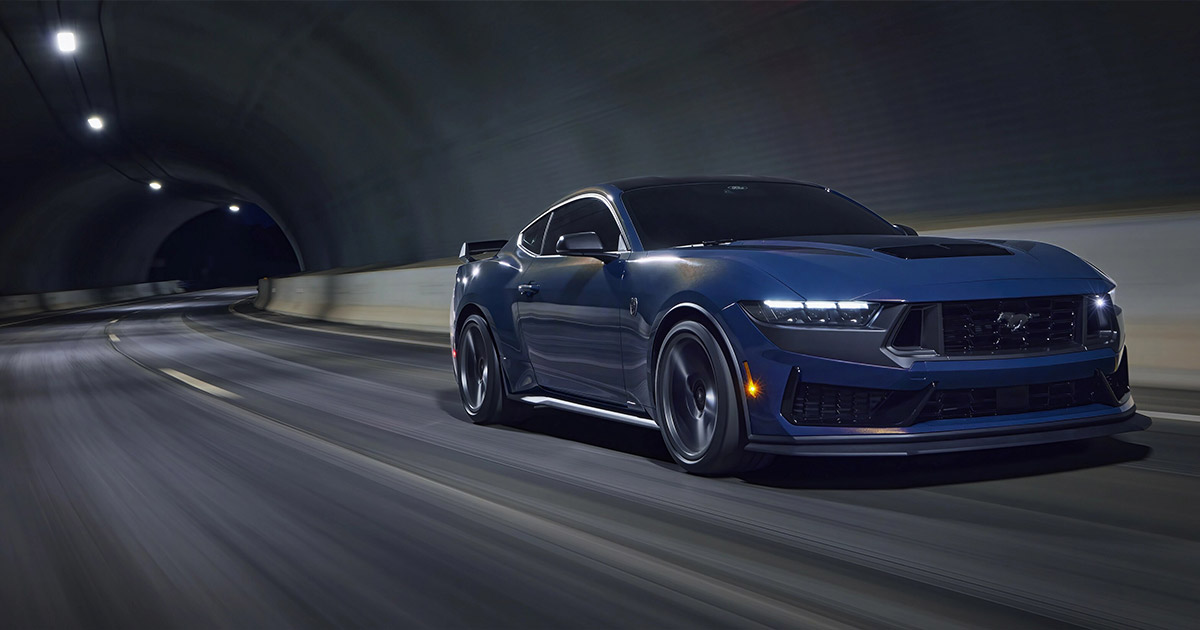 2025 Ford Mustang driving through a tunnel.