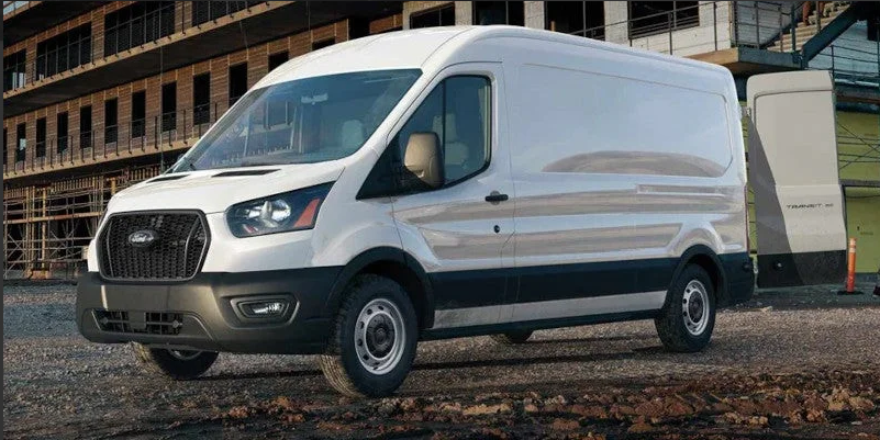 A white 2025 Ford Transit-250 parked at a jobsite.