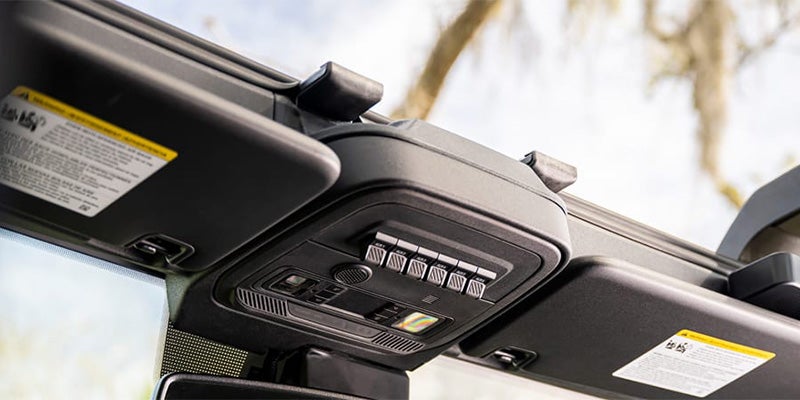 A closer look at the front top, near the visors, controls of the ford bronco 